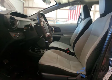 2012 Toyota Prius C z USA, uszkodzony, nr VIN JTDKDTB37C1521981